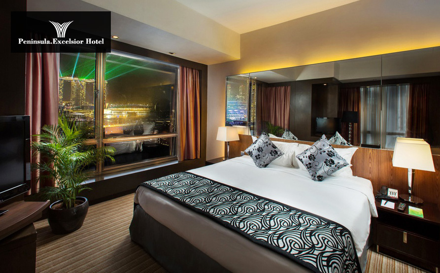 Peninsula Excelsior Hotel  新加坡半島怡東酒店<br>配備溫馨舒適的木質傢具，濱海藝術中心（Esplanade）和新加坡河（Singapore River）的景致環繞
